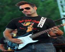 The actor is also a guitarist in a charity rock band Band from TV.